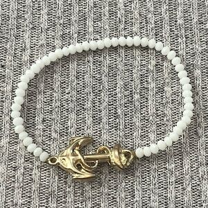 Nautical white beaded stretch bracelet with gold tone anchor charm